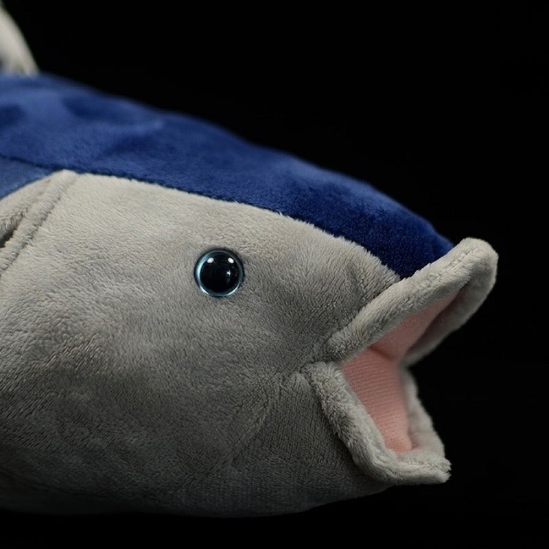 Close-up of Atlantic Bluefin Tuna plush toy’s face with detailed eyes and fish-like mouth