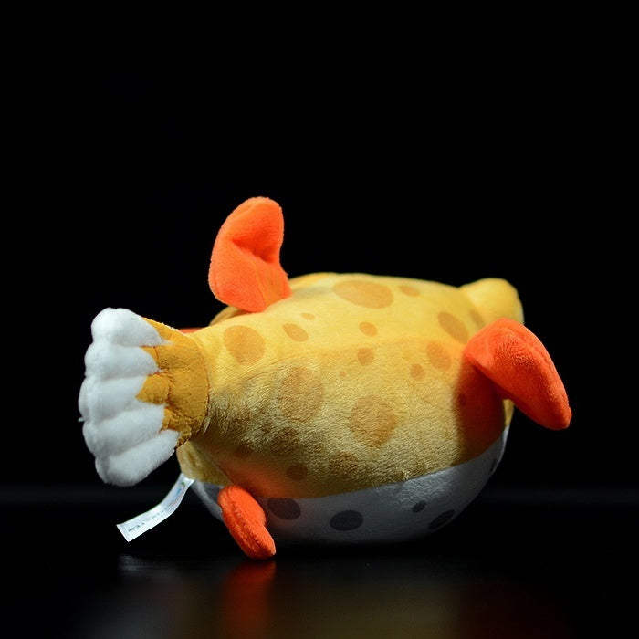 Rear view of the Eastern Smooth Boxfish plush toy, featuring its distinct tail and orange fins