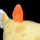 Close-up of the Eastern Smooth Boxfish plush's orange dorsal fin, showcasing its vibrant color
