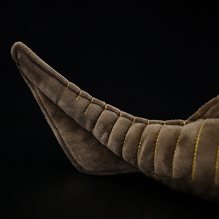 Tail close-up of Cephalaspis plush toy, highlighting its ribbed texture and prehistoric-inspired shape by SoftDaysLab