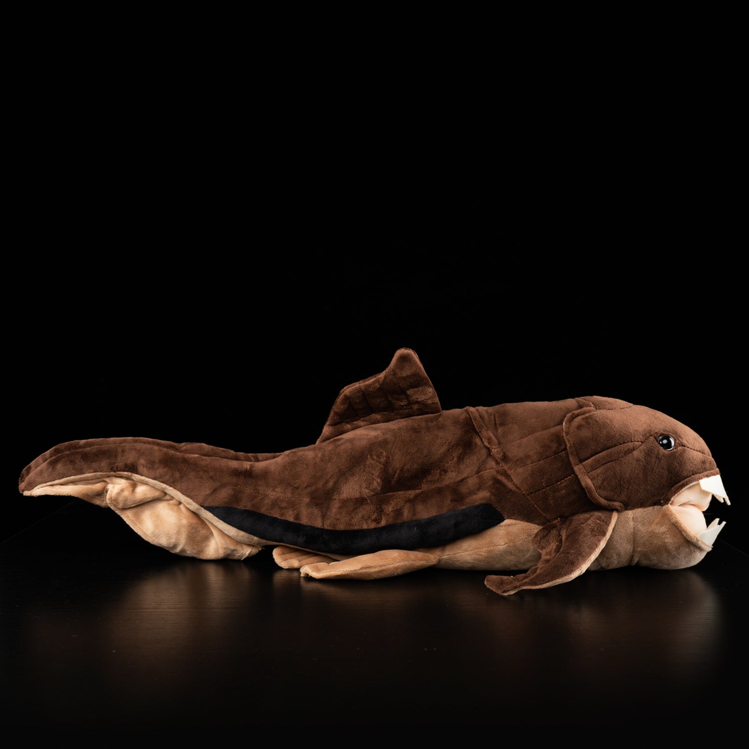 Side profile of Dunkleosteus plush by SoftDaysLab, capturing realistic prehistoric predator details