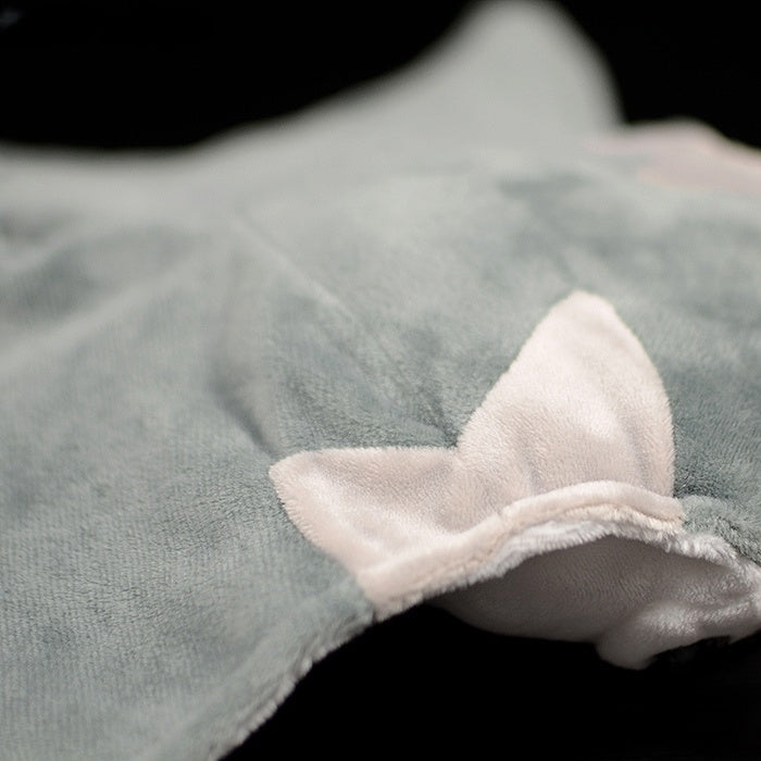 Detailed view of giant devil ray plush wing showcasing soft gray fabric and smooth stitching
