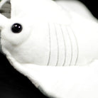 Close-up of giant devil ray plush face showing soft white fabric and stitched details for ocean lovers
