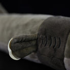  Close-up of lifelike cookiecutter shark plush toy’s fin with detailed stitching and soft texture
