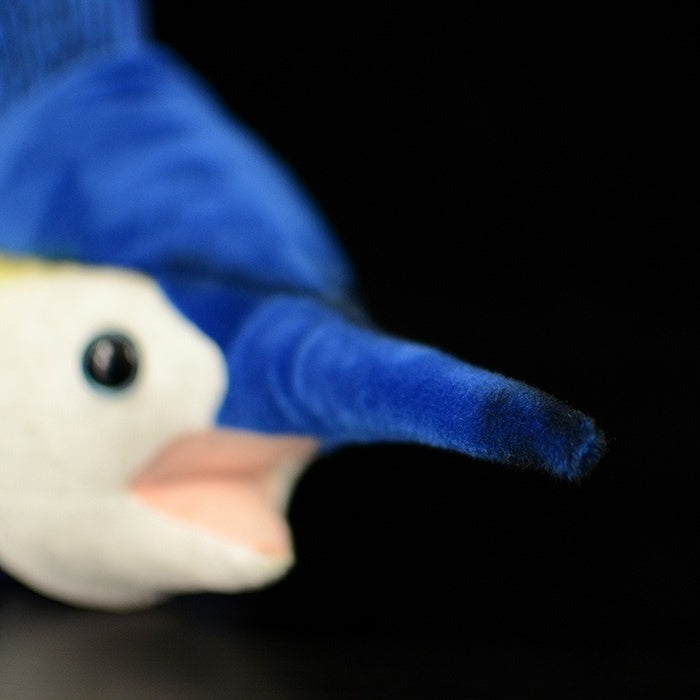 Close-up of the pointed bill of an Indo-Pacific Sailfish plush toy, showcasing its accurate design