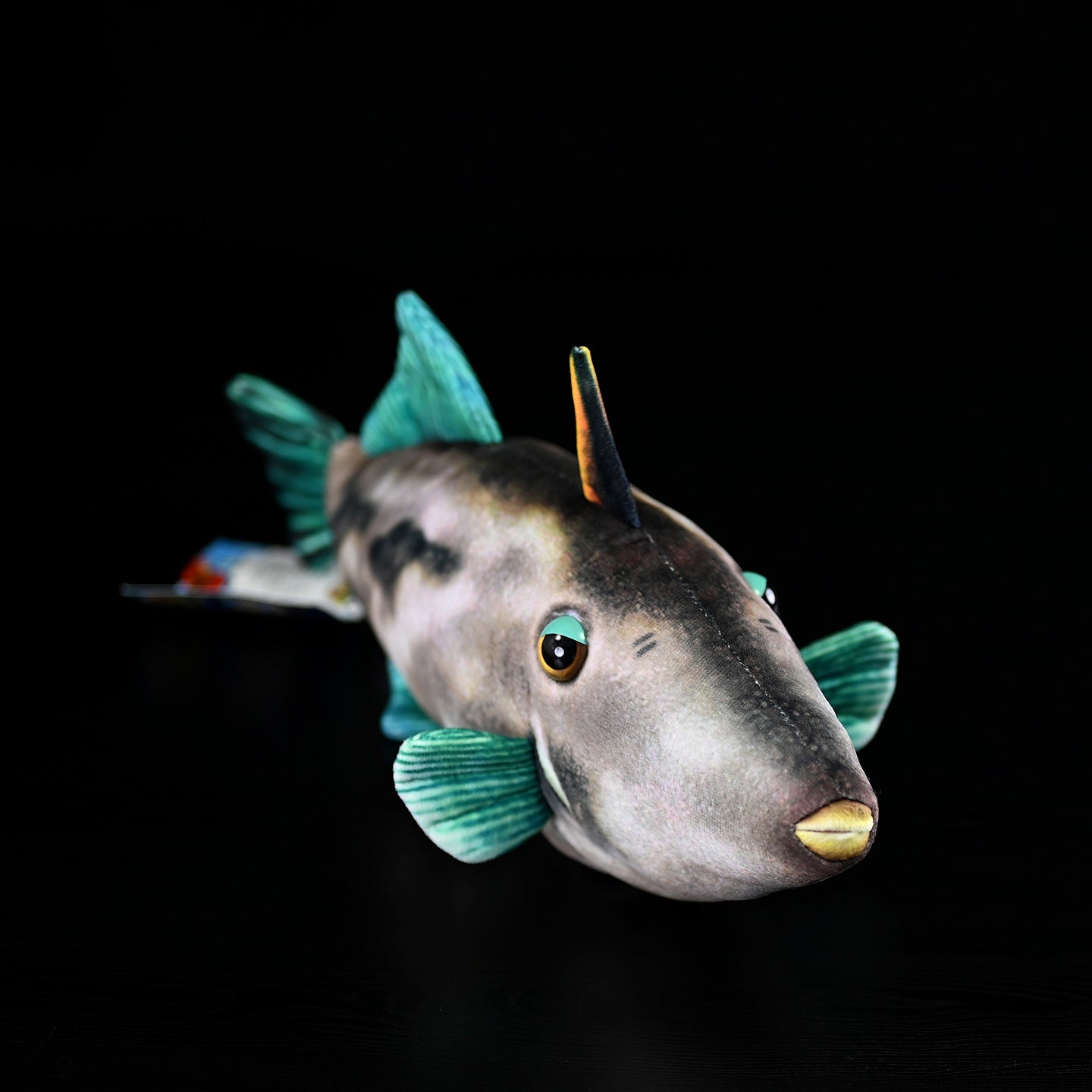 Angled view of Greenfin Horse-Faced Filefish plush toy, perfect for ocean-themed collections or gifts