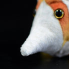 Close-up of the pointed snout of a Copperband Butterflyfish plush toy with intricate detailing
