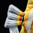 Tail fin detail of a Copperband Butterflyfish plush toy by SoftDaysLab, showing vivid colors and fine craftsmanship