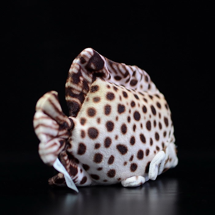 Back view of the spotted scat plush, showing detailed patterns and a lifelike tail design