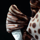 Tail detail of the spotted scat plush, showing lifelike patterns and high-quality craftsmanship