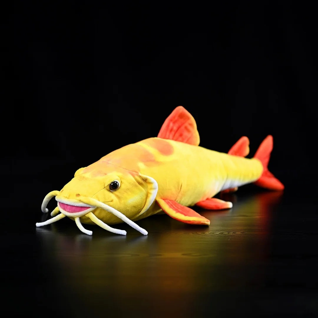 Golden Redtail Catfish Plush by SoftDaysLab® with lifelike details and vibrant yellow-red colors