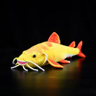 Golden Redtail Catfish Plush by SoftDaysLab® with lifelike details and vibrant yellow-red colors
