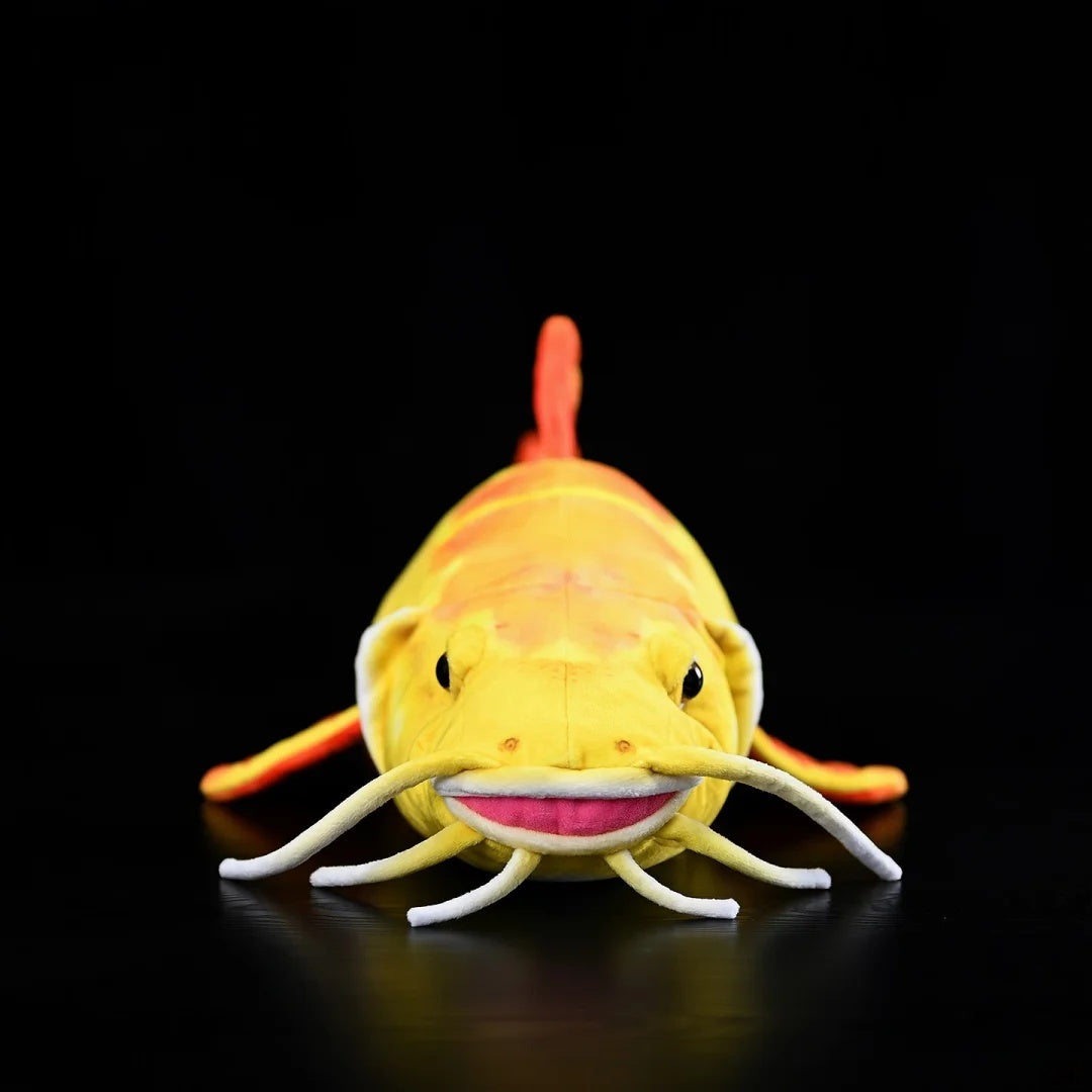 Front view of Golden Redtail Catfish Plush by SoftDaysLab® featuring realistic whiskers and smooth texture