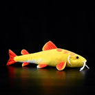 Side profile of Golden Redtail Catfish Plush by SoftDaysLab® showcasing vibrant aquatic-inspired design
