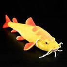 Vibrant Golden Redtail Catfish Plush by SoftDaysLab®, perfect for aquatic animal lovers and collectors