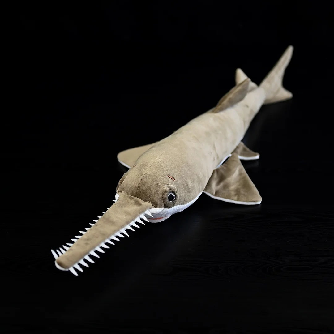 Largetooth Sawfish Plush by SoftDaysLab®, replicating the iconic snout and angular fins of the sawfish