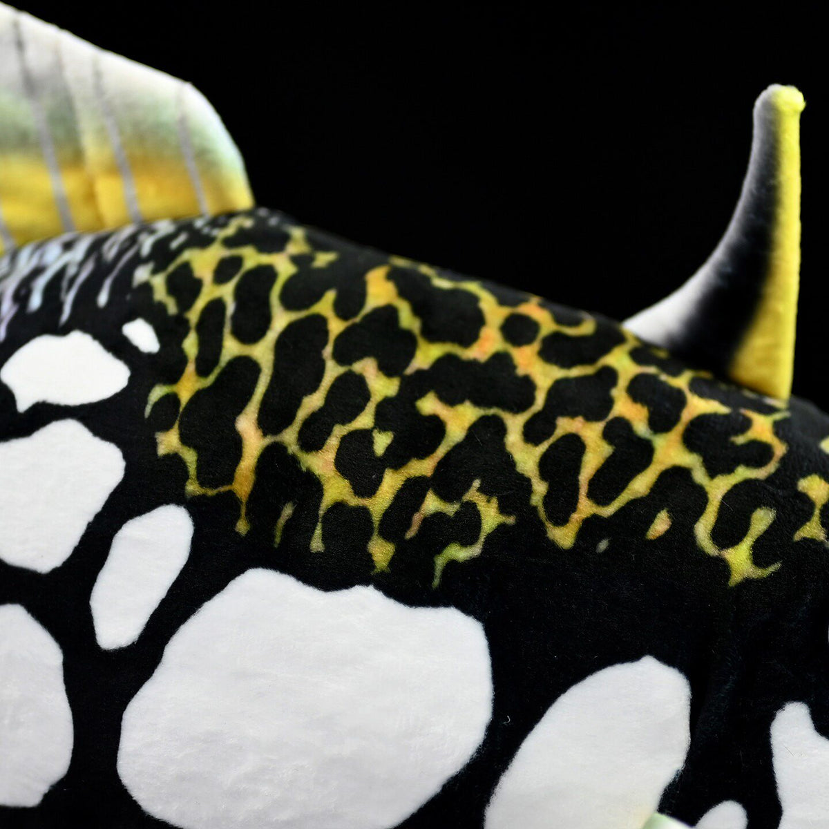 Close-up of the Clown Triggerfish plush's patterned body by SoftDaysLab®, showing its lifelike leopard design