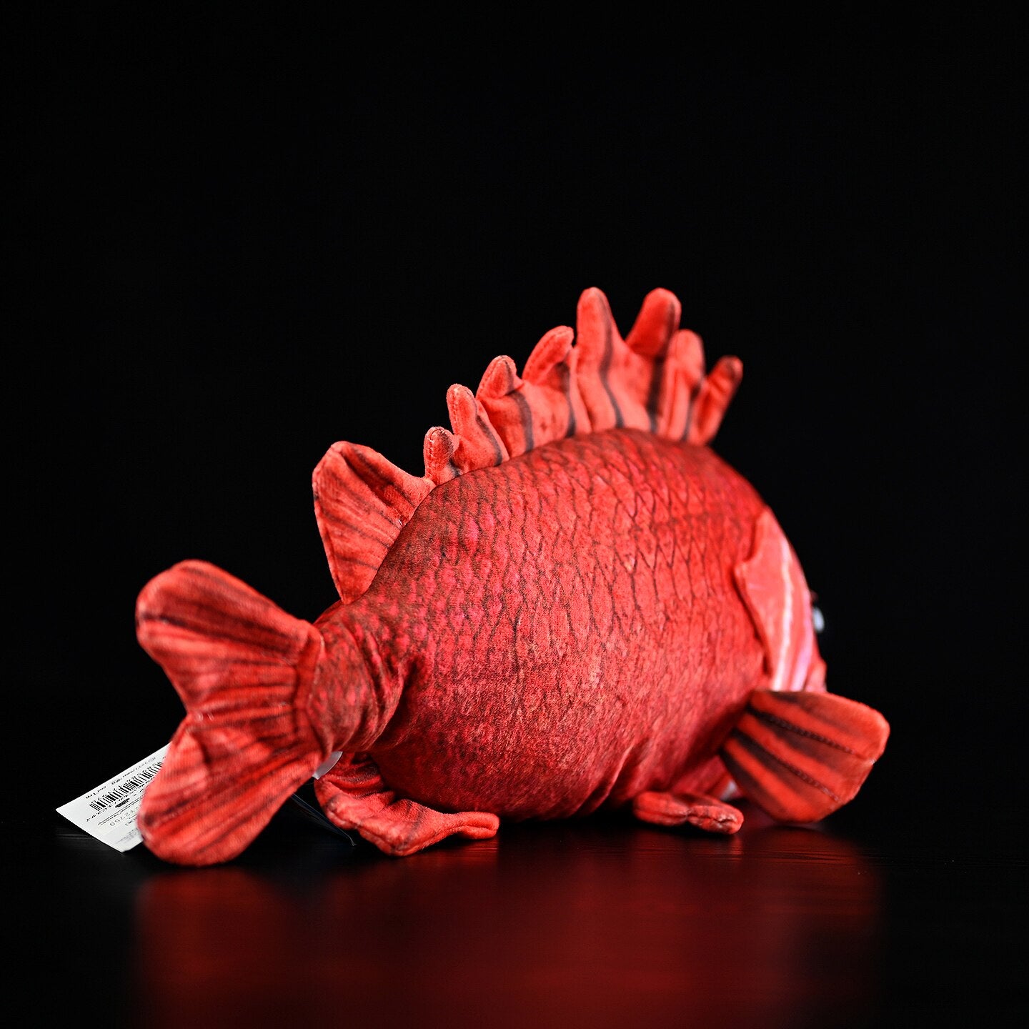 Rear view of Japanese soldierfish (Ebisudai) plush toy by SoftDaysLab, emphasizing textured tail and spiny fin details