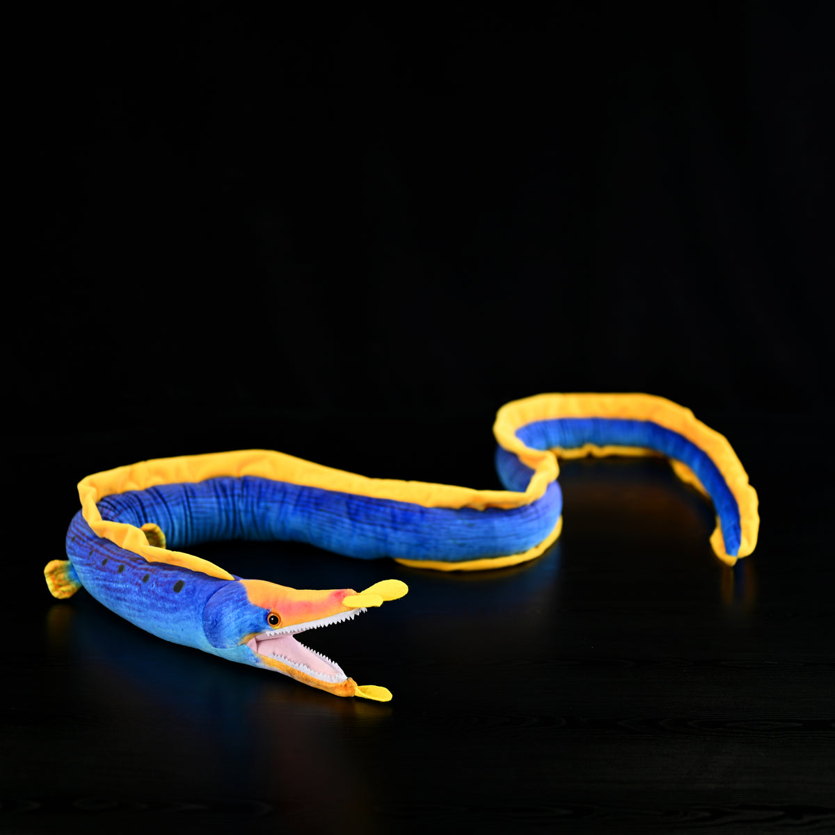 Lifelike Ribbon Eel Plush Toy by SoftDaysLab® with its mouth open, featuring realistic details