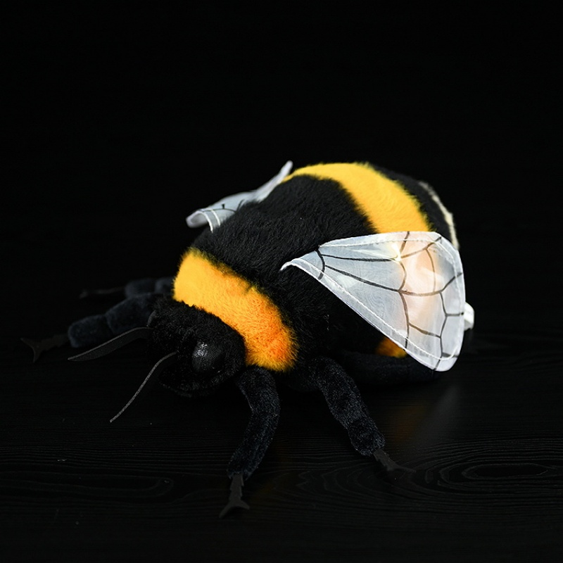 Full view of a lifelike bumblebee plush toy with soft yellow and black body and see-through wings by SoftDaysLab