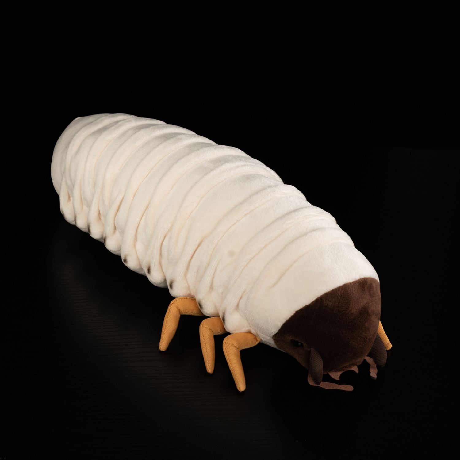Side angle of the full White Grub Plush Toy showcasing its brown head and segmented white body by SoftDaysLab