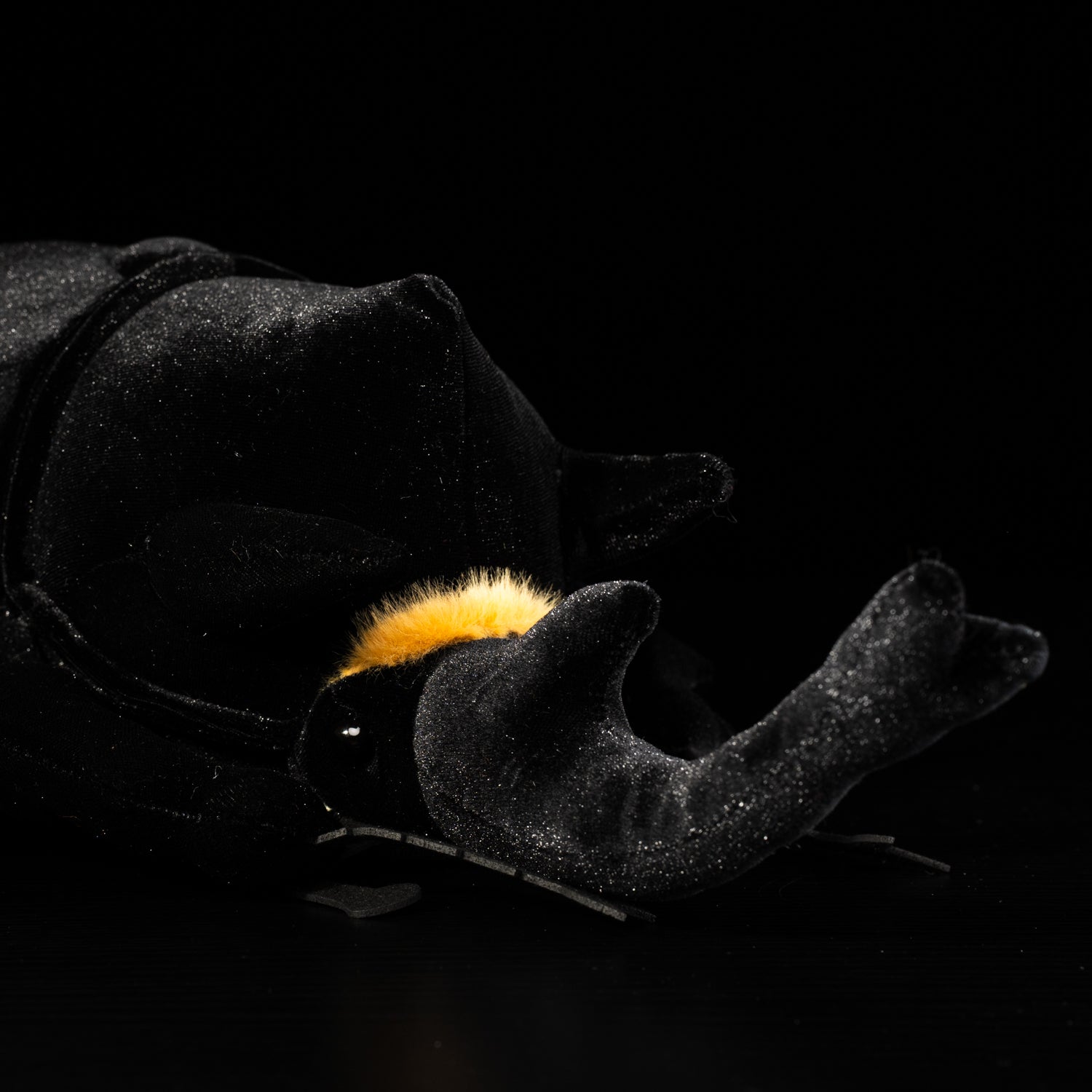Close-up of the Mars rhino beetle plush horn, featuring soft and realistic details for bug enthusiasts
