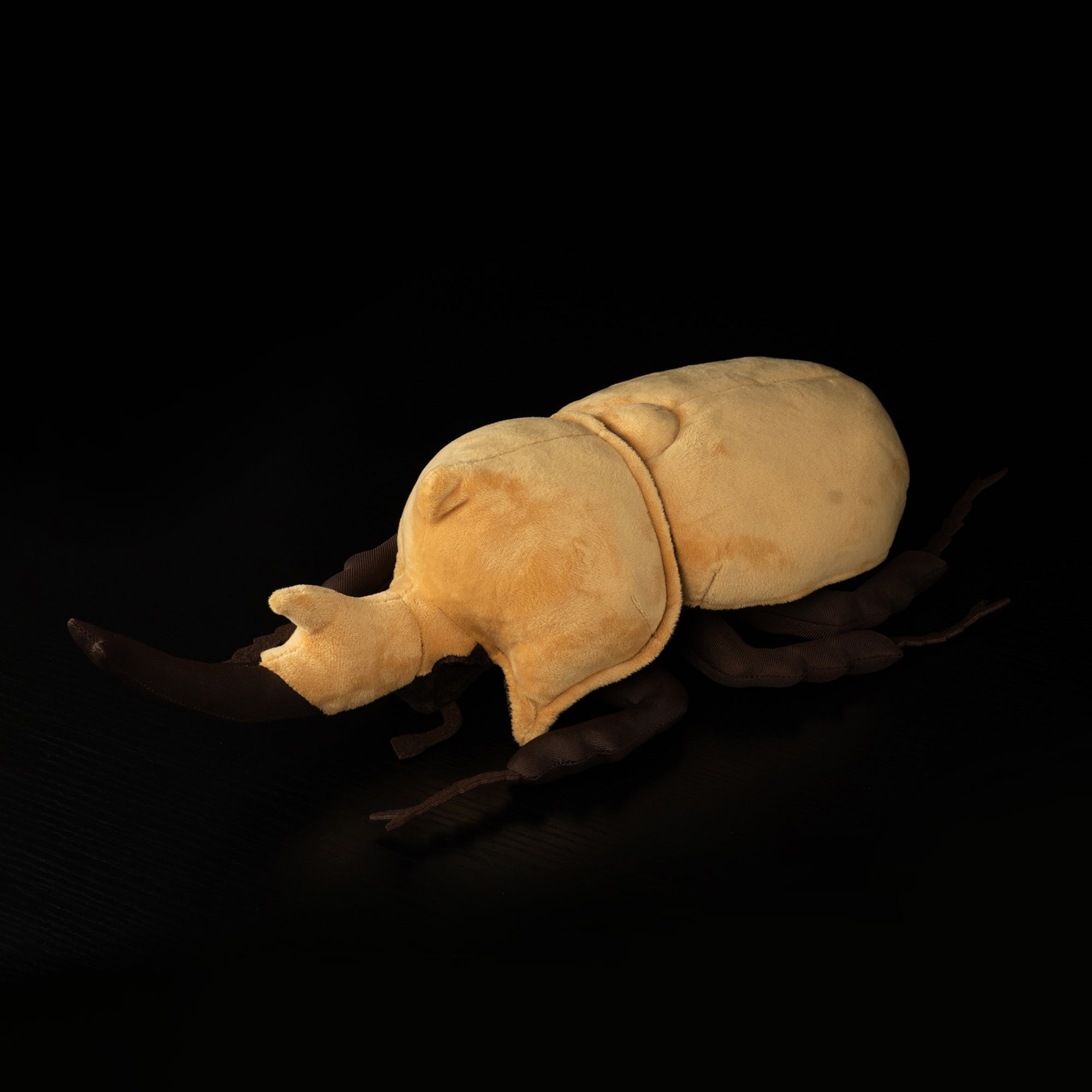Realistic elephant beetle plush toy with yellow elytra and detailed horns by SoftDaysLab®, perfect for collectors