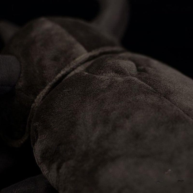 Zoomed-in view of the Atlas beetle plush toy's body texture, showcasing its soft and high-quality material