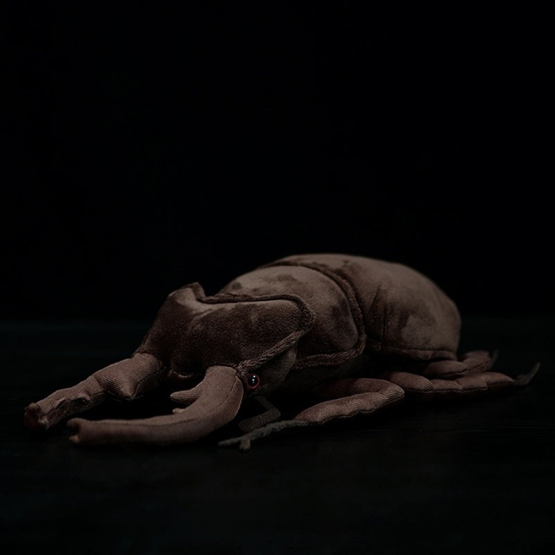 Side view of a realistic stag beetle plush with lifelike horns and soft texture by SoftDaysLab