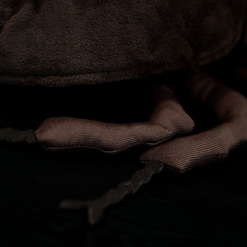 Close-up of the lifelike stag beetle plush toy's legs, highlighting the realistic texture and delicate design'