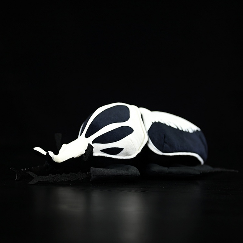 Side view of a lifelike Goliath beetle plush toy with intricate patterns by SoftDaysLabEnthusiasts