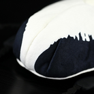 Close-up of the plush Goliath beetle's back, showcasing realistic texture and unique markings
