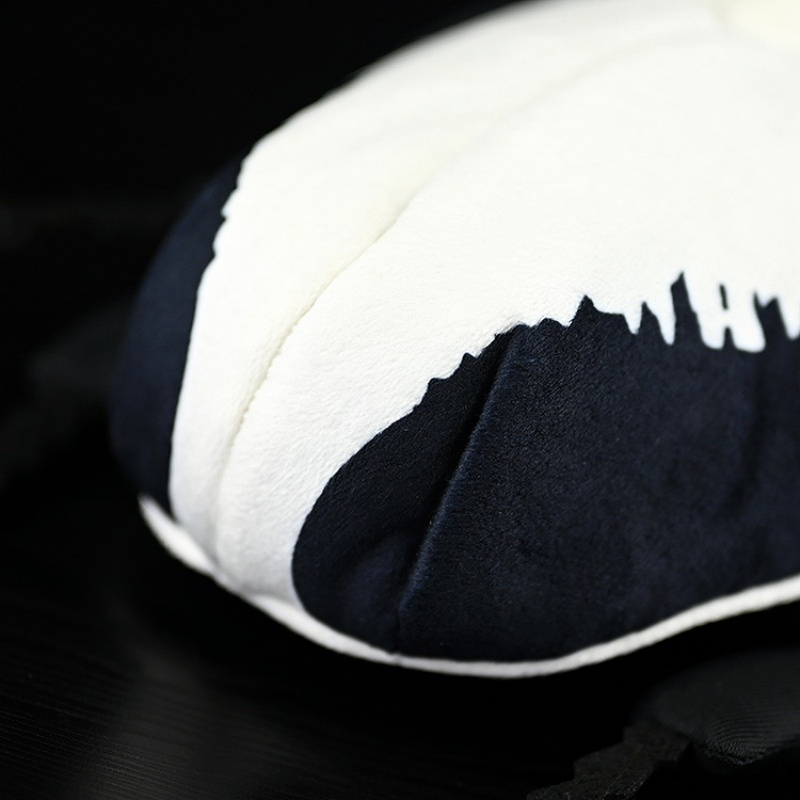 Close-up of the plush Goliath beetle's back, showcasing realistic texture and unique markings