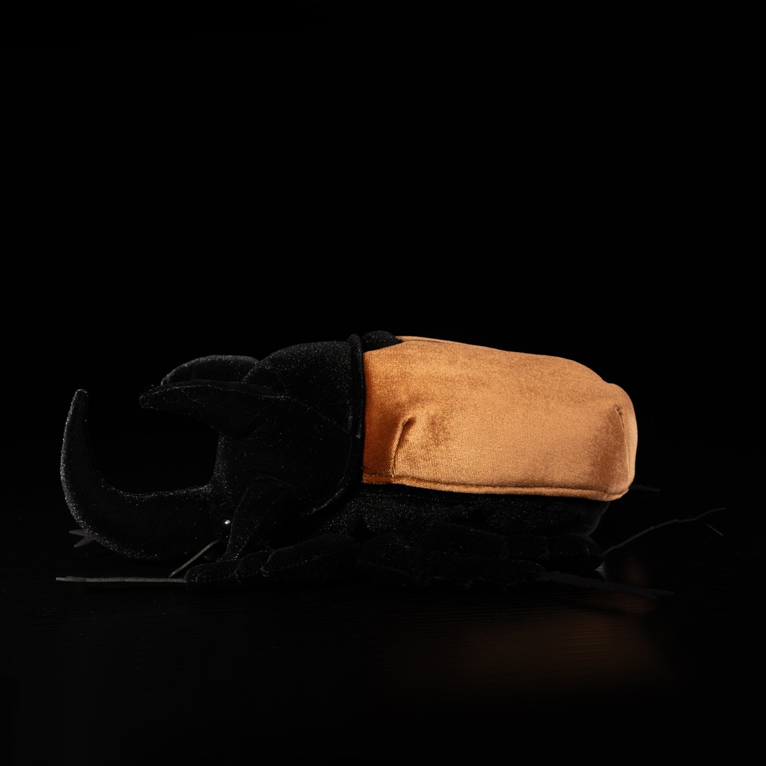 Side view of a five-horned rhinoceros beetle plush with lifelike details by SoftDaysLab