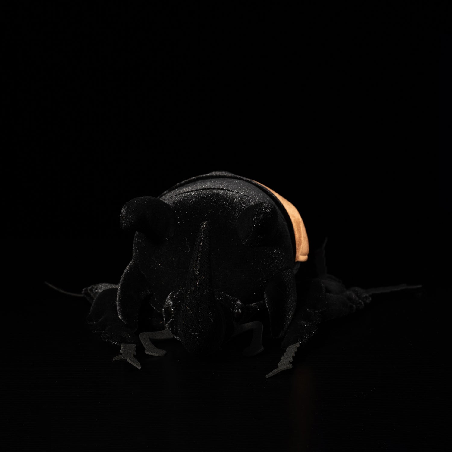 Front view of the lifelike five-horned beetle plush toy showing its prominent cephalic horn by SoftDaysLab