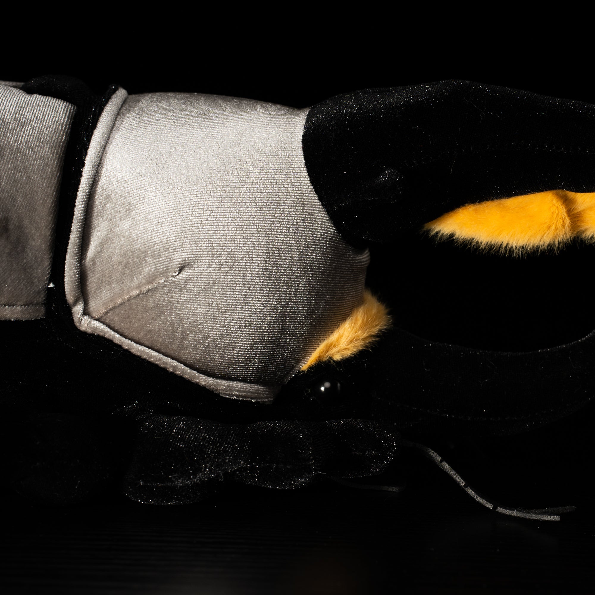 Zoomed-in view of Western Hercules beetle plush highlighting its realistic gray body and textured horns