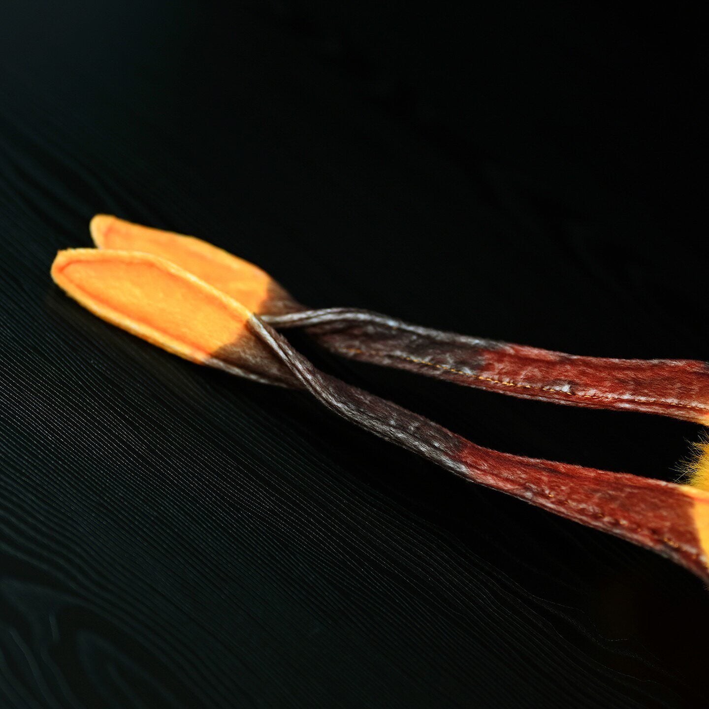 Focus on the tail of Comet Moth stuffed plush, showcasing the unique and realistic tail design