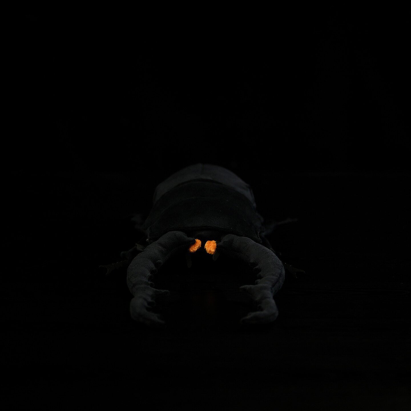 Front view of lifelike Giraffe Stag Beetle plush toy, featuring glowing mandibles, perfect for insect lovers and collectors