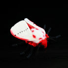 Top view of the Rosy Ermine Moth Plush by SoftDaysLab®, showcasing its vibrant red body, detailed wings, and lifelike black spots