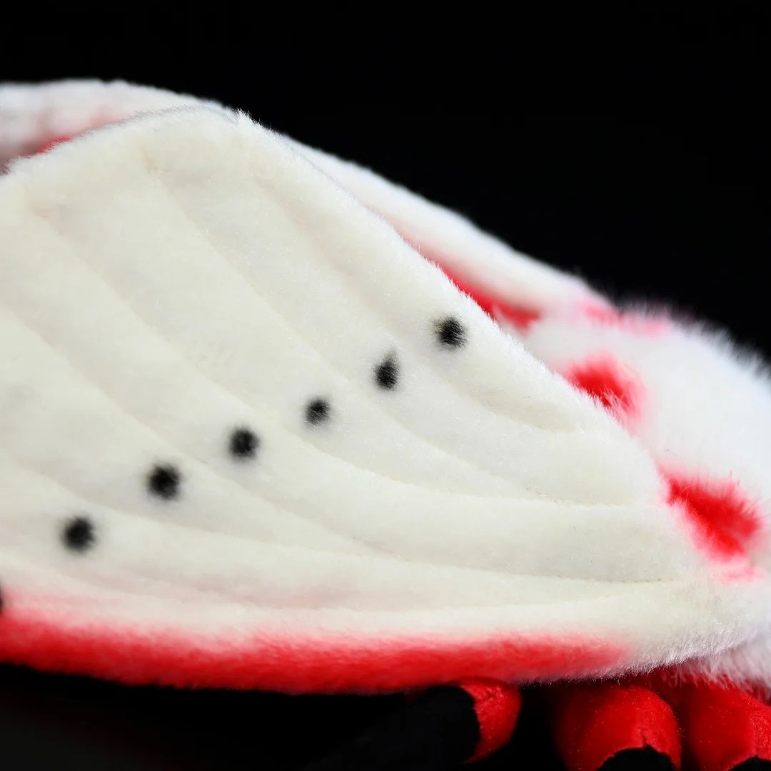 Close-up of the intricate spotted wings on the Rosy Ermine Moth Plush by SoftDaysLab®, inspired by tropical moths