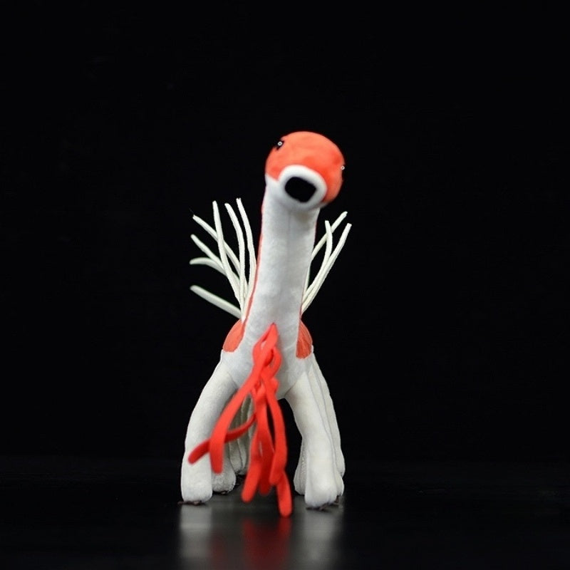 Front view of the Hallucigenia plush toy, showcasing its head and unique spiny body design in detail