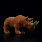 Side view of Arsinoitherium plush toy with realistic horns and soft fur by SoftDaysLab