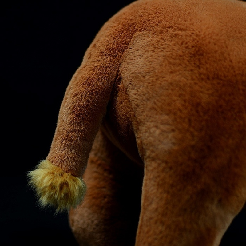 Close-up of Arsinoitherium plush toy’s tail, featuring soft fur and lifelike details