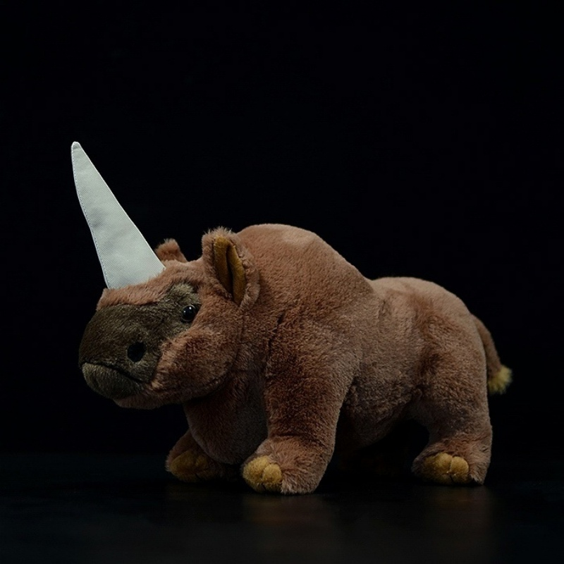 Side view of Elasmotherium plush toy with its iconic single horn and soft fur by SoftDaysLab