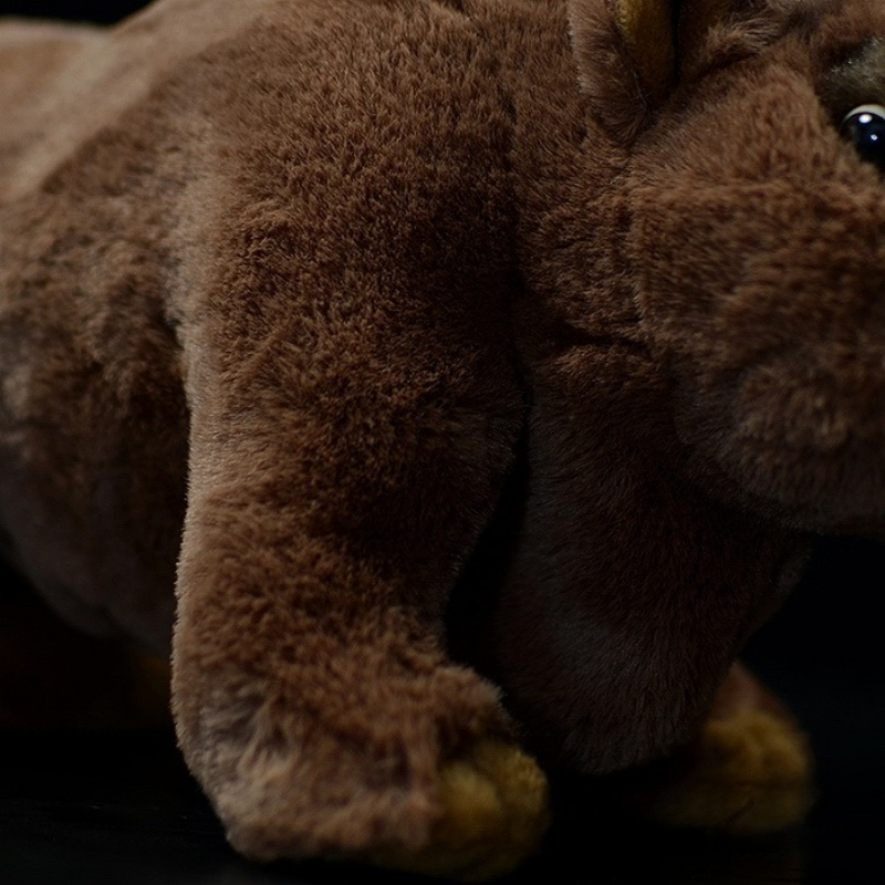 Close-up of Elasmotherium plush toy's sturdy legs and soft fur with lifelike details