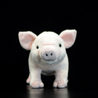 Front view of a white pig plush toy with a smiling face, ideal for cuddling or display