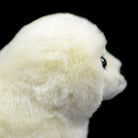 Detailed side view of white seal pup plush toy, highlighting its soft, fluffy fur texture, by SoftDaysLab