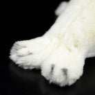 Close-up of realistic back flippers of a white seal pup plush toy, designed for lifelike appeal, by SoftDaysLab