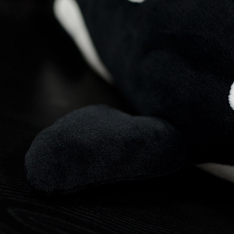 Fin detail of the orca whale plush toy, crafted with soft fabric for a realistic and huggable feel