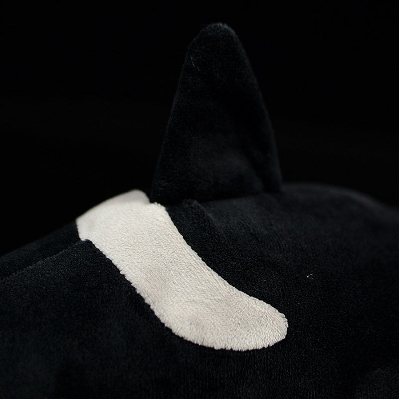 Dorsal fin close-up of the orca whale plush, showcasing its lifelike design and soft-to-touch material